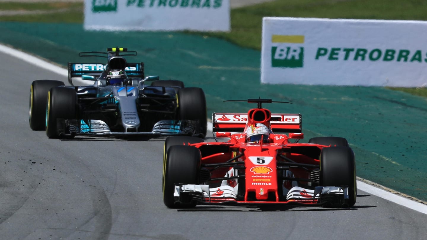 Sebastian Vettel (GER) Ferrari SF70-H and Valtteri Bottas (FIN) Mercedes-Benz F1 W08 Hybrid at Formula One World Championship, Rd19, Brazilian Grand Prix, Race, Interlagos, Sao Paulo, Brazil, Sunday 12 November 2017. © Kym Illman/Sutton Images