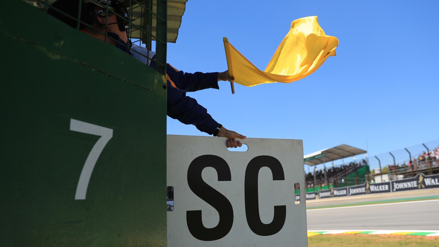 Marshal waves the Yellow flag at Formula One World Championship, Rd19, Brazilian Grand Prix, Race, Interlagos, Sao Paulo, Brazil, Sunday 12 November 2017. © Kym Illman/Sutton Images