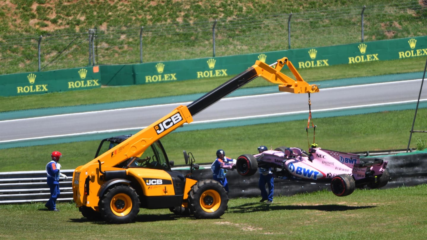 The crashed car of Esteban Ocon (FRA) Force India VJM10 is recovered at Formula One World Championship, Rd19, Brazilian Grand Prix, Race, Interlagos, Sao Paulo, Brazil, Sunday 12 November 2017. © Mark Sutton/Sutton Images