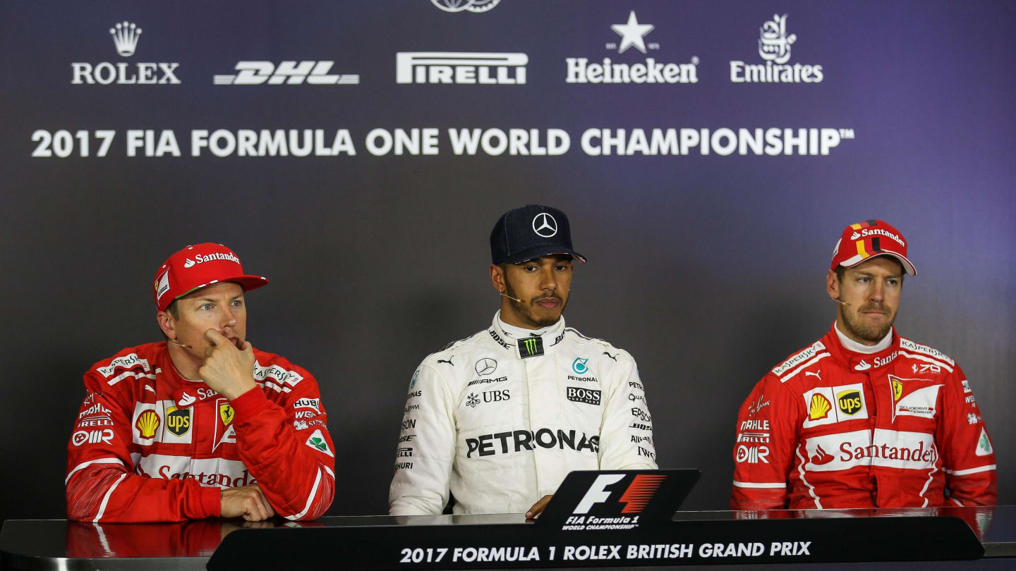 Kimi Raikkonen (FIN) Ferrari, pole sitter Lewis Hamilton (GBR) Mercedes AMG F1 and Sebastian Vettel