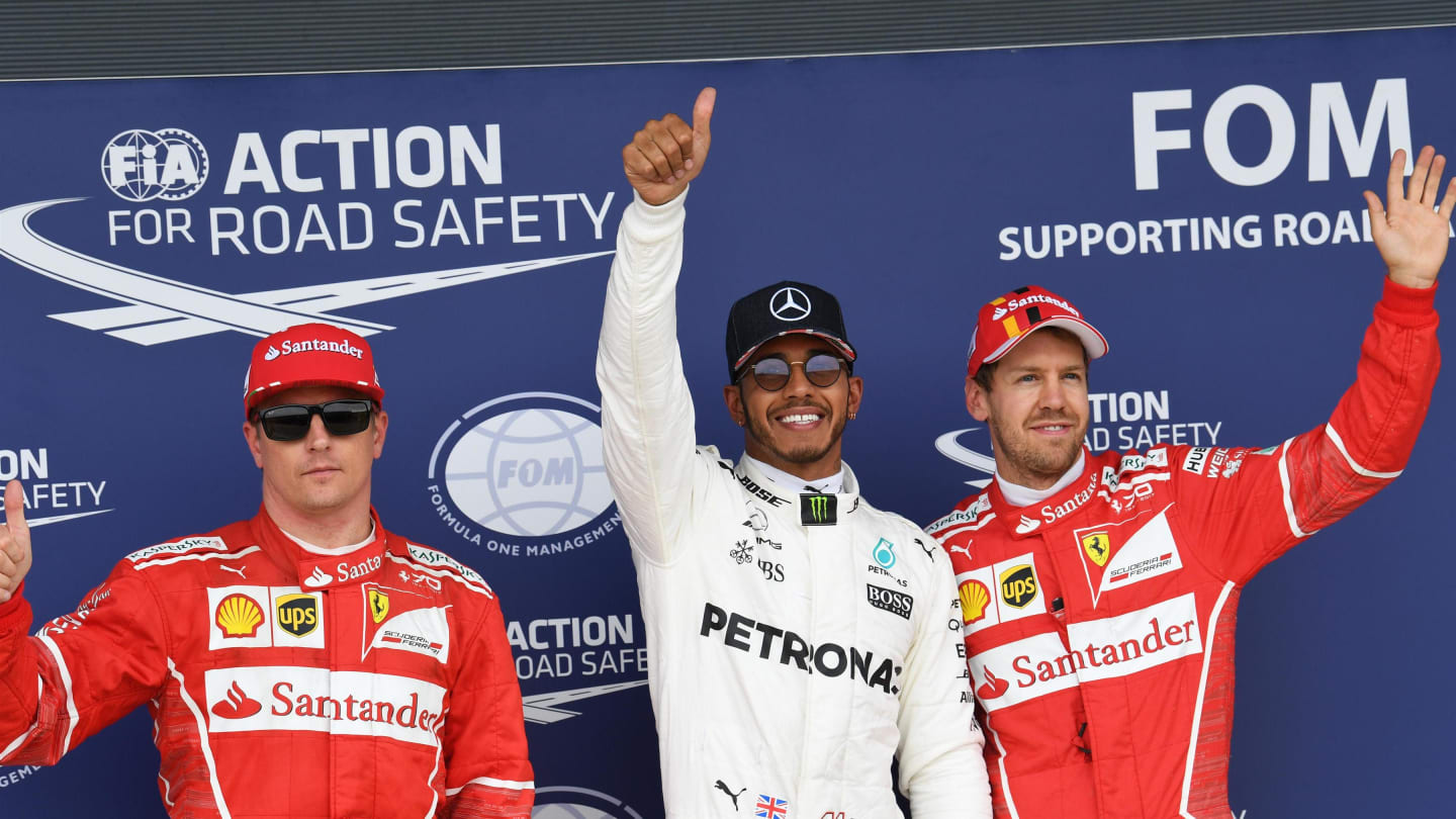 Kimi Raikkonen (FIN) Ferrari, Lewis Hamilton (GBR) Mercedes AMG F1 and Sebastian Vettel (GER)
