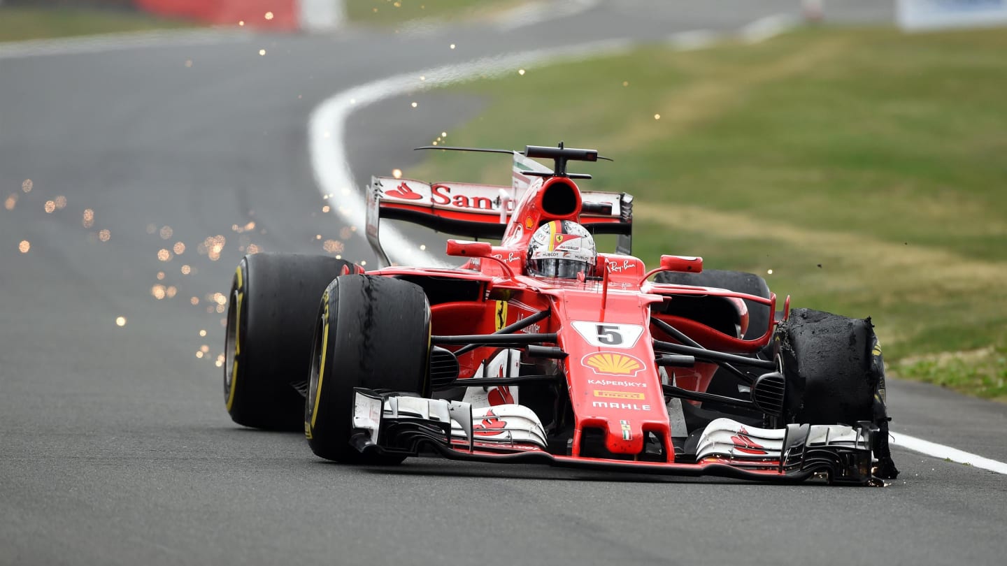 Sebastian Vettel (GER) Ferrari SF70-H with front delaminating tyre at Formula One World