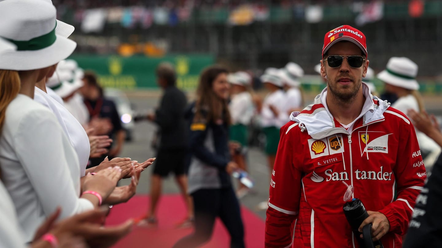 Sebastian Vettel (GER) Ferrari on the drivers parade at Formula One World Championship, Rd10,