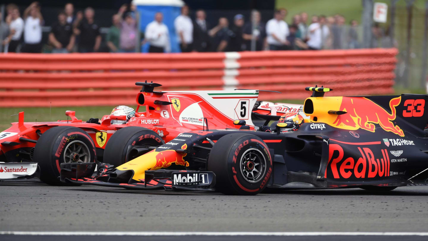 Sebastian Vettel (GER) Ferrari SF70-H and Max Verstappen (NED) Red Bull Racing RB13 battle for position at Formula One World Championship, Rd10, British Grand Prix, Race, Silverstone, England, Sunday 16 July 2017. © Sutton Images