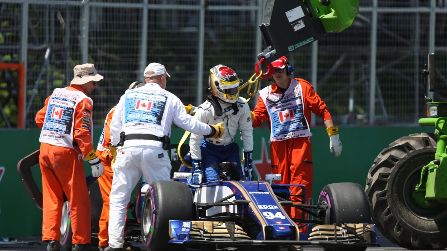 Marshals recover the car of Pascal Wehrlein (GER) Sauber C36 after spinning out in Q1 at Formula One World Championship, Rd7, Canadian Grand Prix, Qualifying, Montreal, Canada, Saturday 10 June 2017. © Sutton Motorsport Images