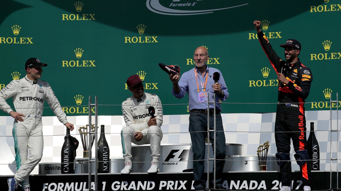 Patrick Stewart (GBR) Actor celebrates and drinks from the boot of Daniel Ricciardo (AUS) Red Bull Racing alongside Race winner Lewis Hamilton (GBR) Mercedes AMG F1 and Valtteri Bottas (FIN) Mercedes AMG F1 on the podium at Formula One World Championship, Rd7, Canadian Grand Prix, Race, Montreal, Canada, Sunday 11 June 2017. © Sutton Images
