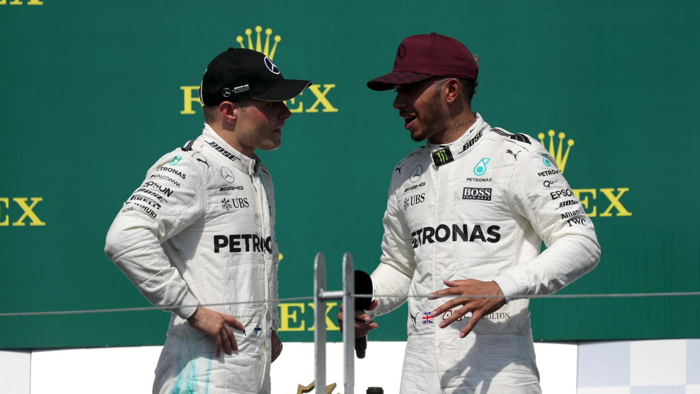 Race winner Lewis Hamilton (GBR) Mercedes AMG F1 celebrates on the podium with Valtteri Bottas (FIN) Mercedes AMG F1 at Formula One World Championship, Rd7, Canadian Grand Prix, Race, Montreal, Canada, Sunday 11 June 2017. © Sutton Images