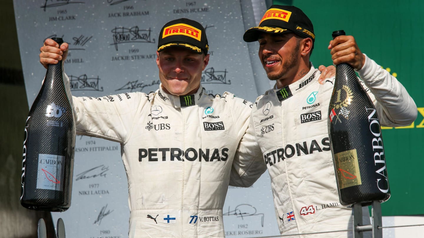 Valtteri Bottas (FIN) Mercedes AMG F1 celebrates on the podium with the champagne alongside race winner Lewis Hamilton (GBR) Mercedes AMG F1 at Formula One World Championship, Rd7, Canadian Grand Prix, Race, Montreal, Canada, Sunday 11 June 2017. © Sutton Motorsport Images