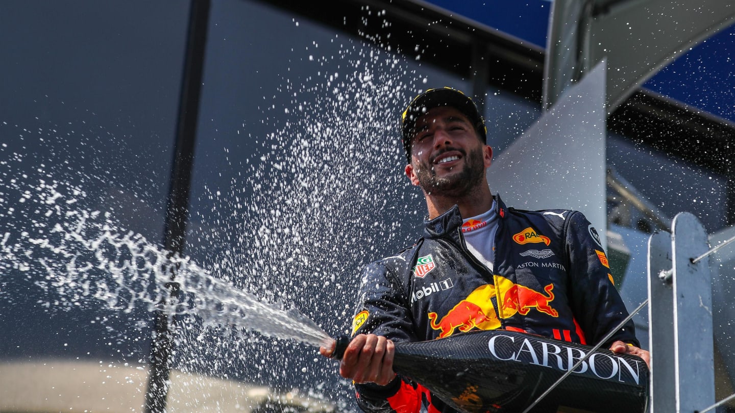 Daniel Ricciardo (AUS) Red Bull Racing celebrates on the podium with the champagne at Formula One