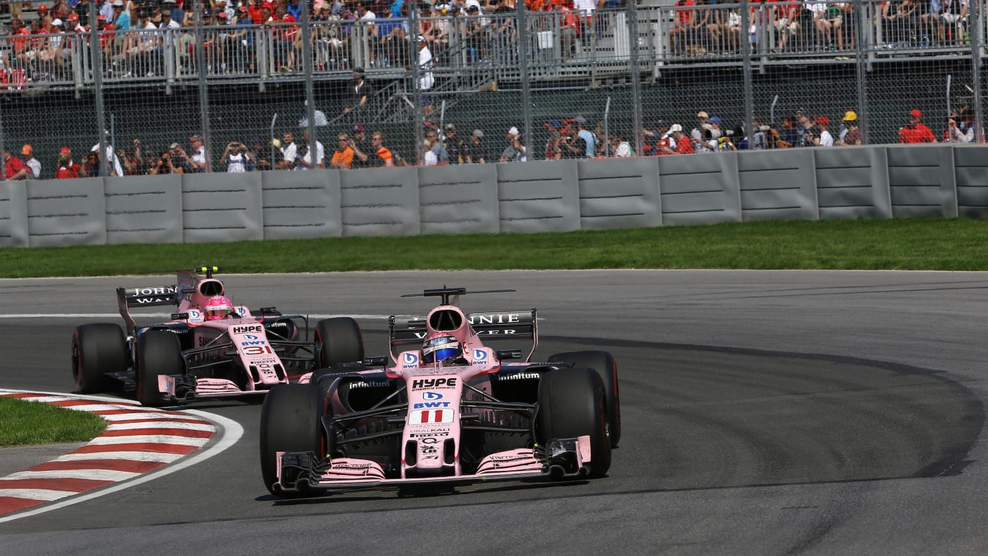 Sergio Perez (MEX) Force India VJM10 and Esteban Ocon (FRA) Force India VJM10 at Formula One World