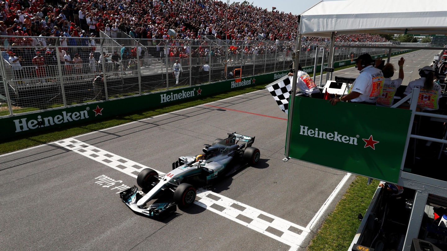 Race winner Lewis Hamilton (GBR) Mercedes-Benz F1 W08 Hybrid crosse the line at Formula One World