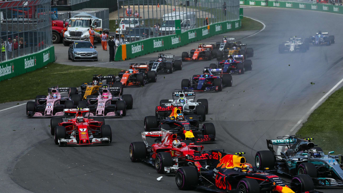 Valtteri Bottas (FIN) Mercedes-Benz F1 W08 Hybrid, Max Verstappen (NED) Red Bull Racing RB13 and Sebastian Vettel (GER) Ferrari SF70-H battle at the start of the race at Formula One World Championship, Rd7, Canadian Grand Prix, Race, Montreal, Canada, Sunday 11 June 2017. © Sutton Images
