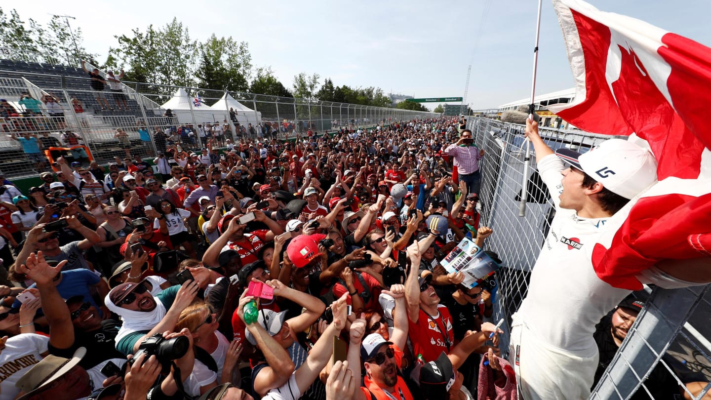 Ninth place finisher Lance Stroll (CDN) Williams celebrates with the fans at Formula One World