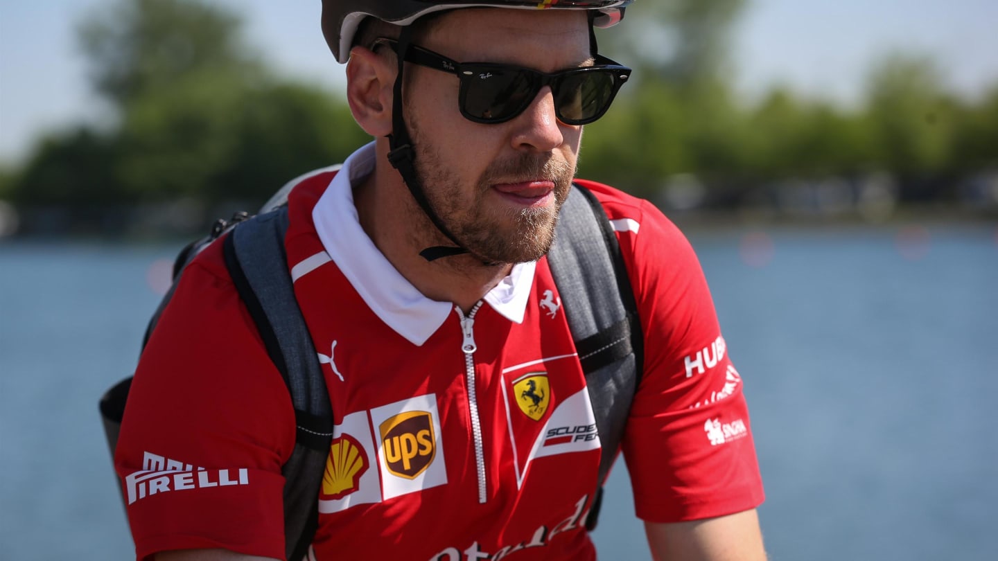 Sebastian Vettel (GER) Ferrari on a bike at Formula One World Championship, Rd7, Canadian Grand Prix, Preparations, Montreal, Canada, Thursday 8 June 2017.