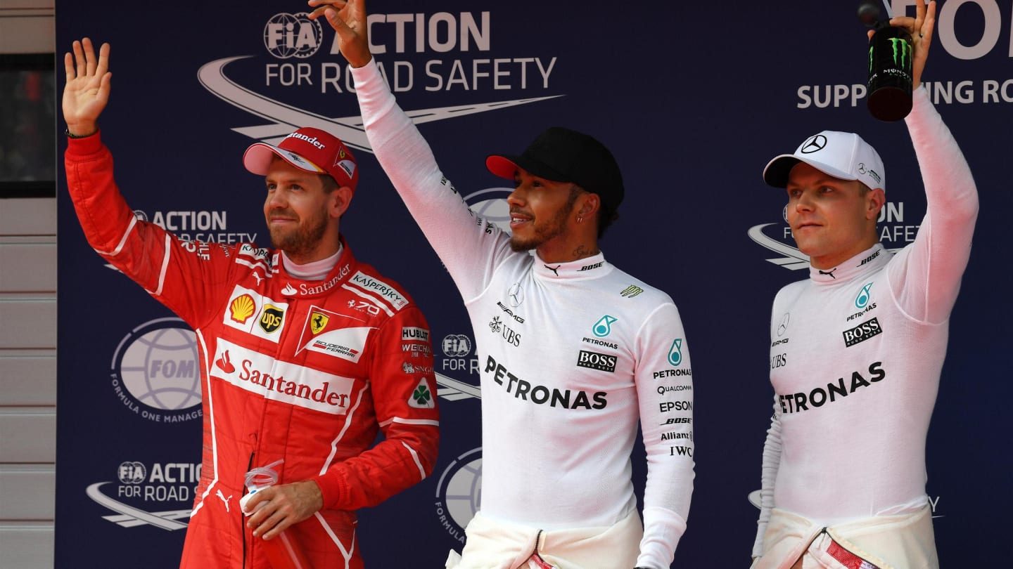 (L to R): Vettel (GER) Ferrari, Hamilton (GBR) and Bottas (FIN) Mercedes AMG F1 celebrate in parc ferme at Formula One World Championship, Rd2, Chinese Grand Prix, Qualifying, Shanghai, China, Saturday 8 April 2017. © Sutton Motorsport Images