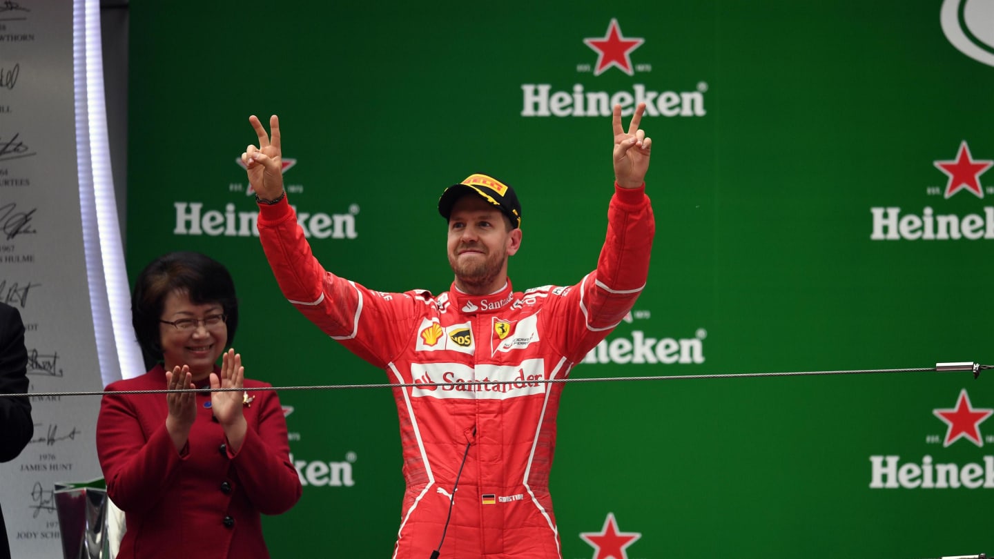 Sebastian Vettel (GER) Ferrari celebrates on the podium at Formula One World Championship, Rd2, Chinese Grand Prix, Race, Shanghai, China, Sunday 9 April 2017. © Sutton Motorsport Images