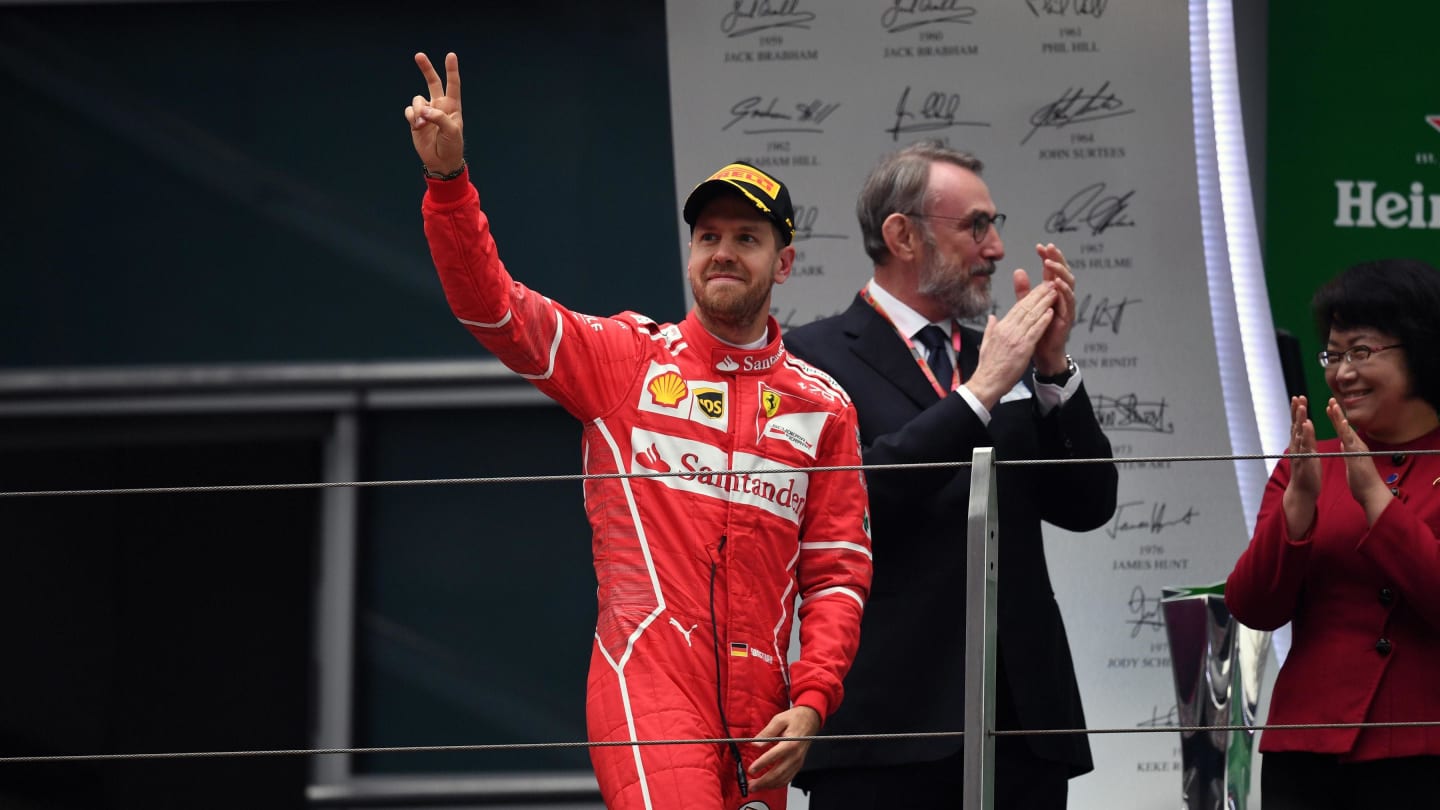 Sebastian Vettel (GER) Ferrari celebrates on the podium at Formula One World Championship, Rd2, Chinese Grand Prix, Race, Shanghai, China, Sunday 9 April 2017. © Sutton Motorsport Images