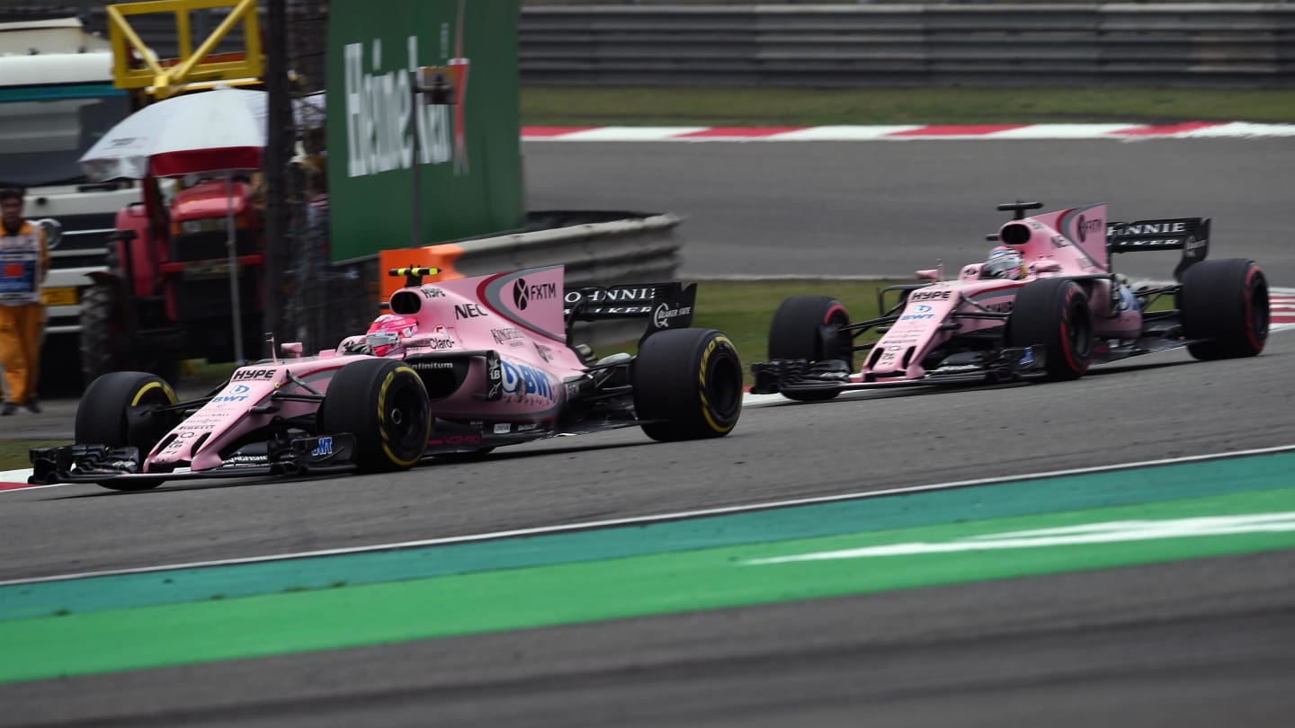 Esteban Ocon (FRA) Force India VJM10 and Sergio Perez (MEX) Force India VJM10 battle for position at Formula One World Championship, Rd2, Chinese Grand Prix, Race, Shanghai, China, Sunday 9 April 2017. © Sutton Motorsport Images