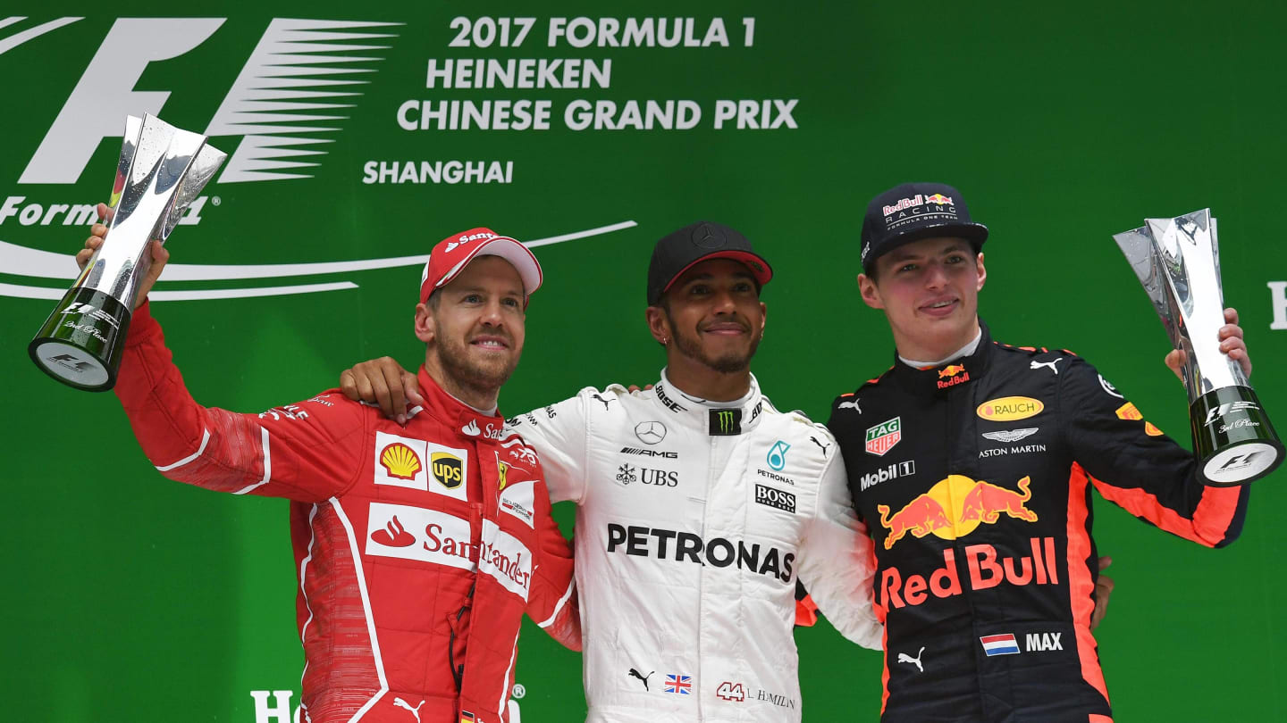 (L to R): Sebastian Vettel (GER) Ferrari, Lewis Hamilton (GBR) Mercedes AMG and Max Verstappen (NED) Red Bull celebrate on the podium at Formula One World Championship, Chinese Grand Prix, Shanghai, China, 9 April 2017. ©Sutton Motorsport Images