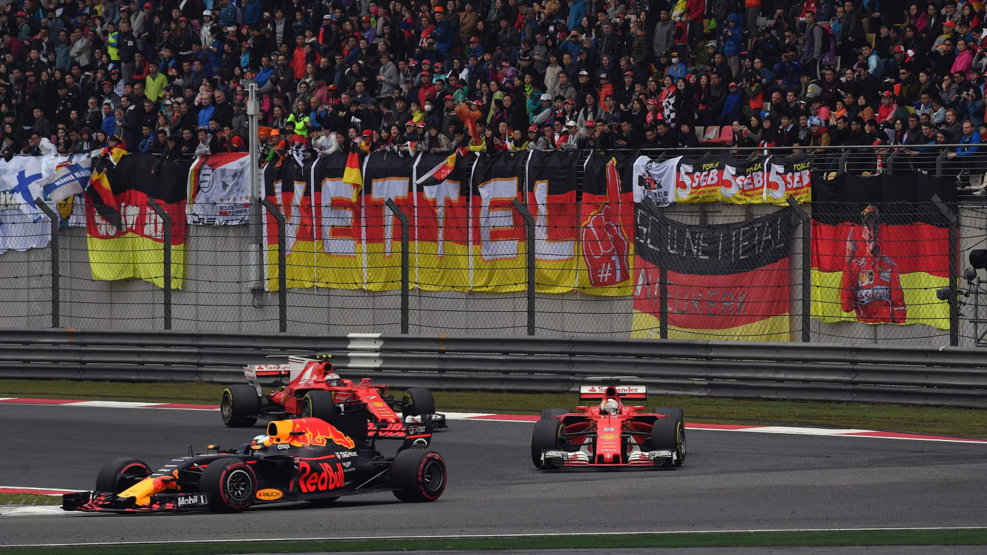 Ricciardo (AUS) Red Bull Racing RB13 leads Vettel (GER) Ferrari SF70-H and Raikkonen (FIN) Ferrari SF70-H at Formula One World Championship, Rd2, Chinese Grand Prix, Race, Shanghai, China, Sunday 9 April 2017. © Sutton Motorsport Images