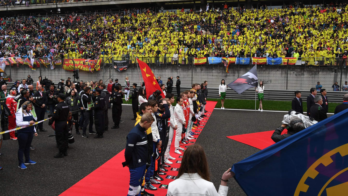 Drivers observe the National Anthem on the grid at Formula One World Championship, Rd2, Chinese Grand Prix, Race, Shanghai, China, Sunday 9 April 2017. © Sutton Motorsport Images