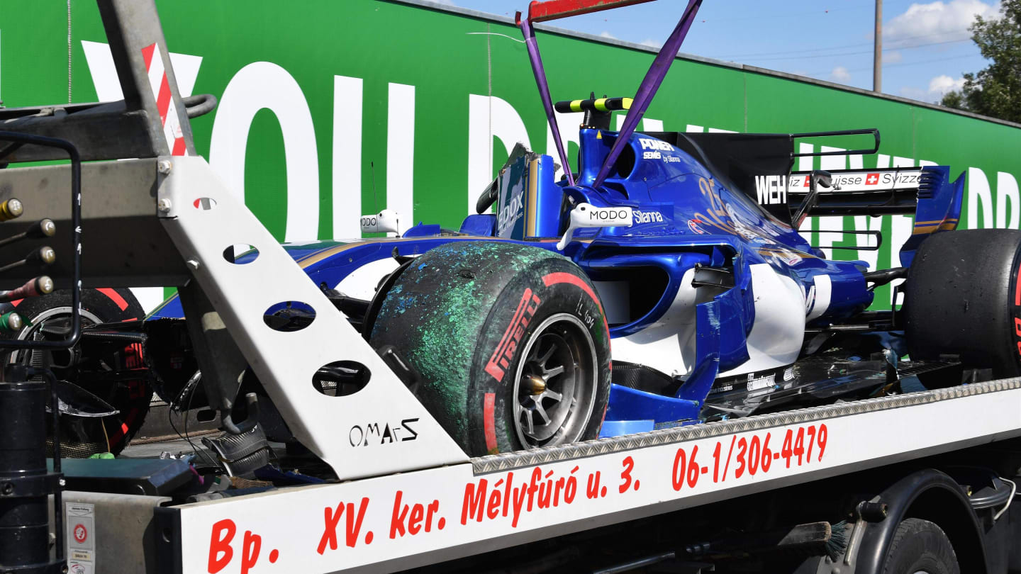 The crashed car of Pascal Wehrlein (GER) Sauber C36 is recovered in FP2 at Formula One World