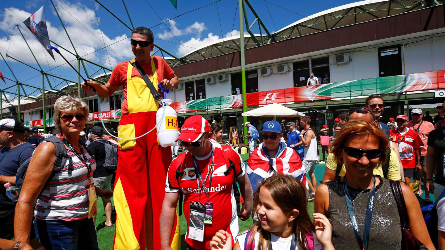 Fans and stilt walker at Formula One World Championship, Rd11, Hungarian Grand Prix, Practice, Hungaroring, Hungary, Friday 28 July 2017. © Sutton Images