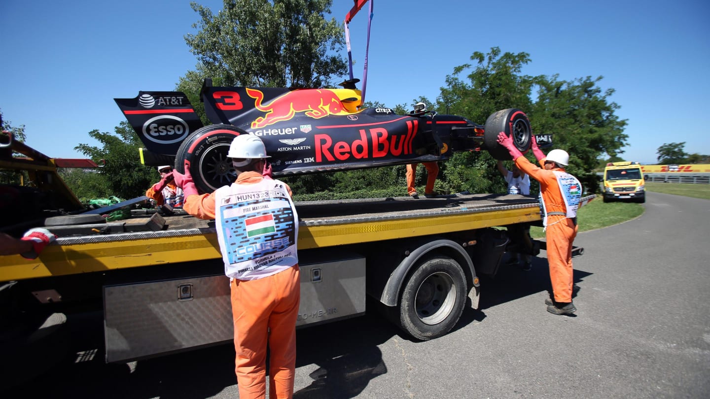 The car of Daniel Ricciardo (AUS) Red Bull Racing RB13 is recovered my Marshals after stopping on track in FP3 at Formula One World Championship, Rd11, Hungarian Grand Prix, Qualifying, Hungaroring, Hungary, Saturday 29 July 2017. © Sutton Images