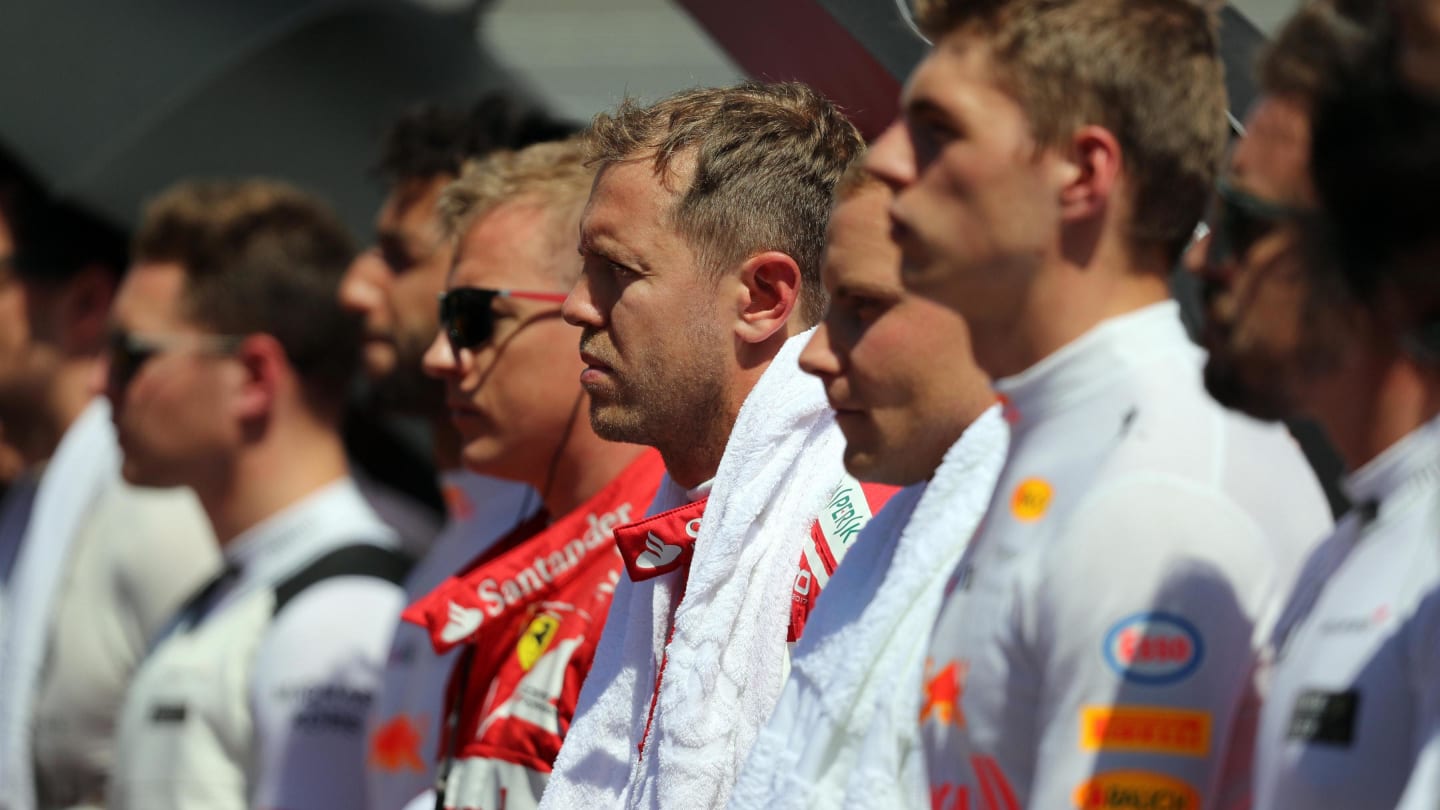 Drivers observe the national anthem on the grid at Formula One World Championship, Rd11, Hungarian Grand Prix, Race, Hungaroring, Hungary, Sunday 30 July 2017. © Sutton Images