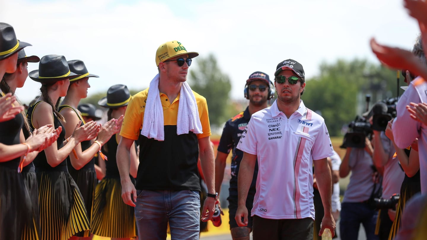 Nico Hulkenberg (GER) Renault Sport F1 Team and Sergio Perez (MEX) Force India on the drivers parade at Formula One World Championship, Rd11, Hungarian Grand Prix, Race, Hungaroring, Hungary, Sunday 30 July 2017. © Sutton Images