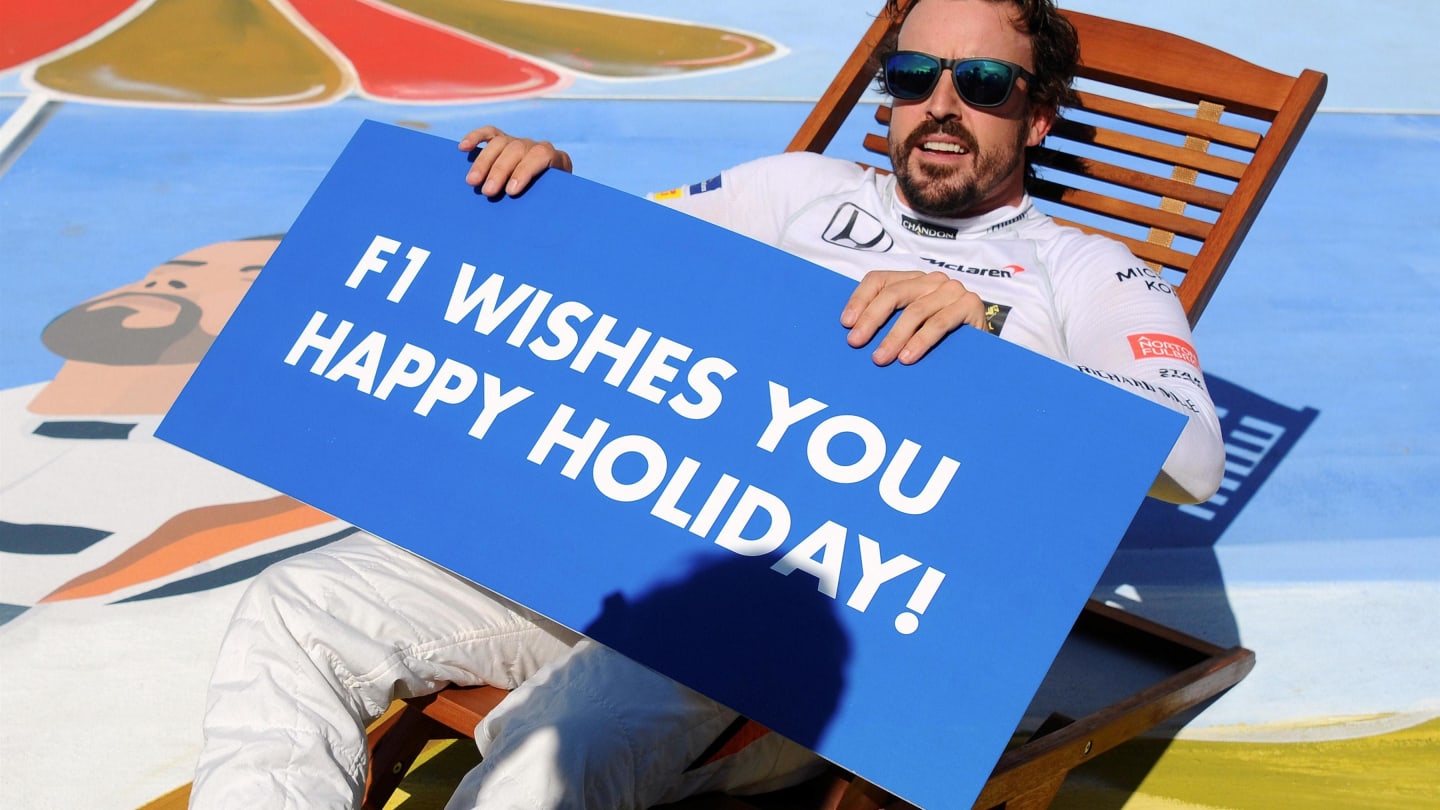 Fernando Alonso (ESP) McLaren celebrates on a deck chair at Formula One World Championship, Rd11,