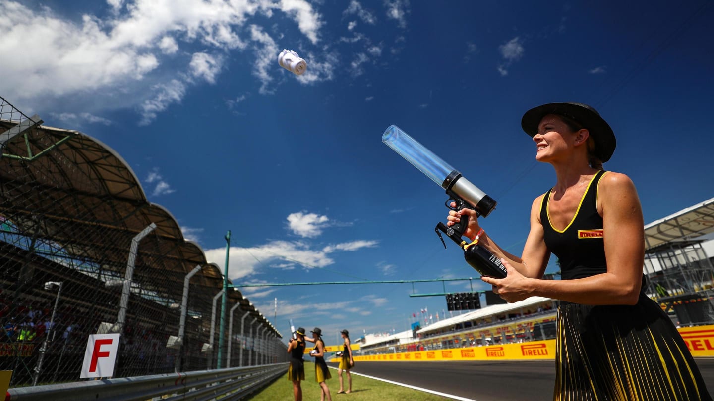 Grid girl fires a T-Shirt into the crowd with a T-Shirt Gun at Formula One World Championship, Rd11, Hungarian Grand Prix, Race, Hungaroring, Hungary, Sunday 30 July 2017. © Sutton Images
