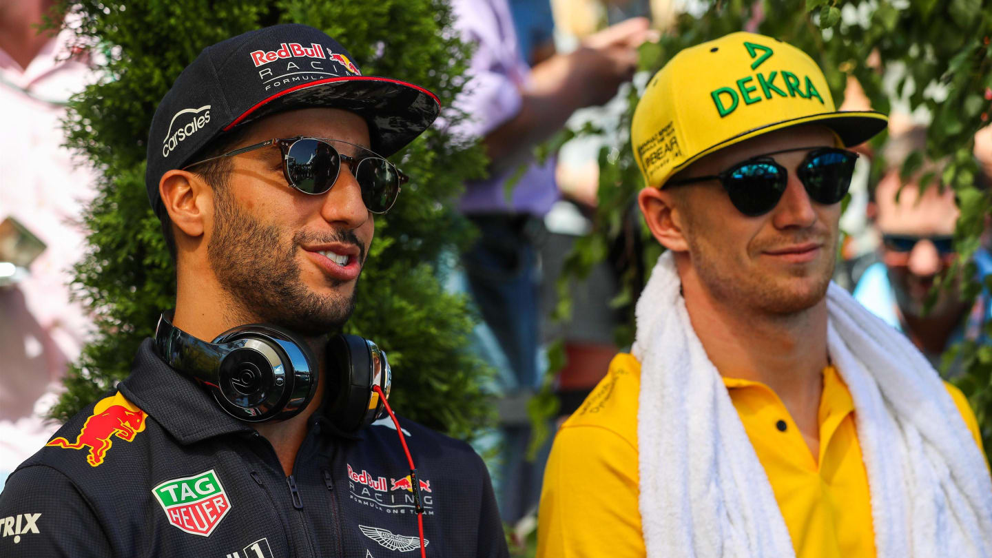 Daniel Ricciardo (AUS) Red Bull Racing and Nico Hulkenberg (GER) Renault Sport F1 Team at Formula