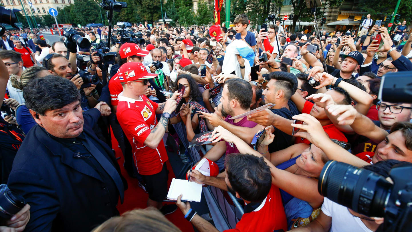 Kimi Raikkonen (FIN) Ferrari signs autographs for the fans at the Parade in Milan at Formula One World Championship, Rd13, Italian Grand Prix, Preparations, Monza, Italy, Thursday 31 August 2017. © Sutton Images