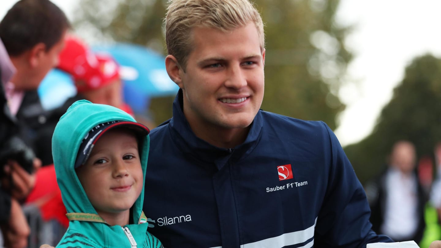 Marcus Ericsson (SWE) Sauber poses for a photo with a young fan at Formula One World Championship, Rd13, Italian Grand Prix, Qualifying, Monza, Italy, Saturday 2 September 2017. © Sutton Images