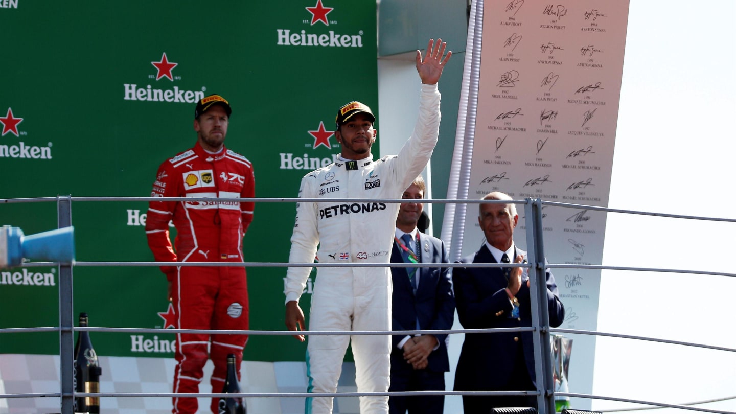 Race winner Lewis Hamilton (GBR) Mercedes AMG F1 and Sebastian Vettel (GER) Ferrari celebrate on the podium at Formula One World Championship, Rd13, Italian Grand Prix, Race, Monza, Italy, Sunday 3 September 2017. © Sutton Images