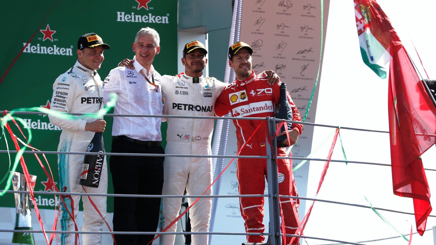 Valtteri Bottas (FIN) Mercedes AMG F1, Lewis Hamilton (GBR) Mercedes AMG F1 and Sebastian Vettel