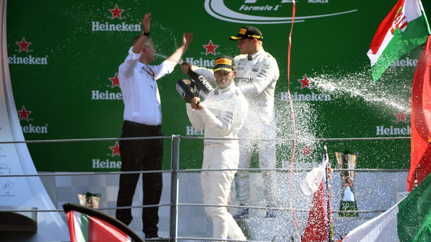 Lewis Hamilton (GBR) Mercedes AMG F1 and Valtteri Bottas (FIN) Mercedes AMG F1 celebrate on the podium with the champagne at Formula One World Championship, Rd13, Italian Grand Prix, Race, Monza, Italy, Sunday 3 September 2017. © Sutton Images