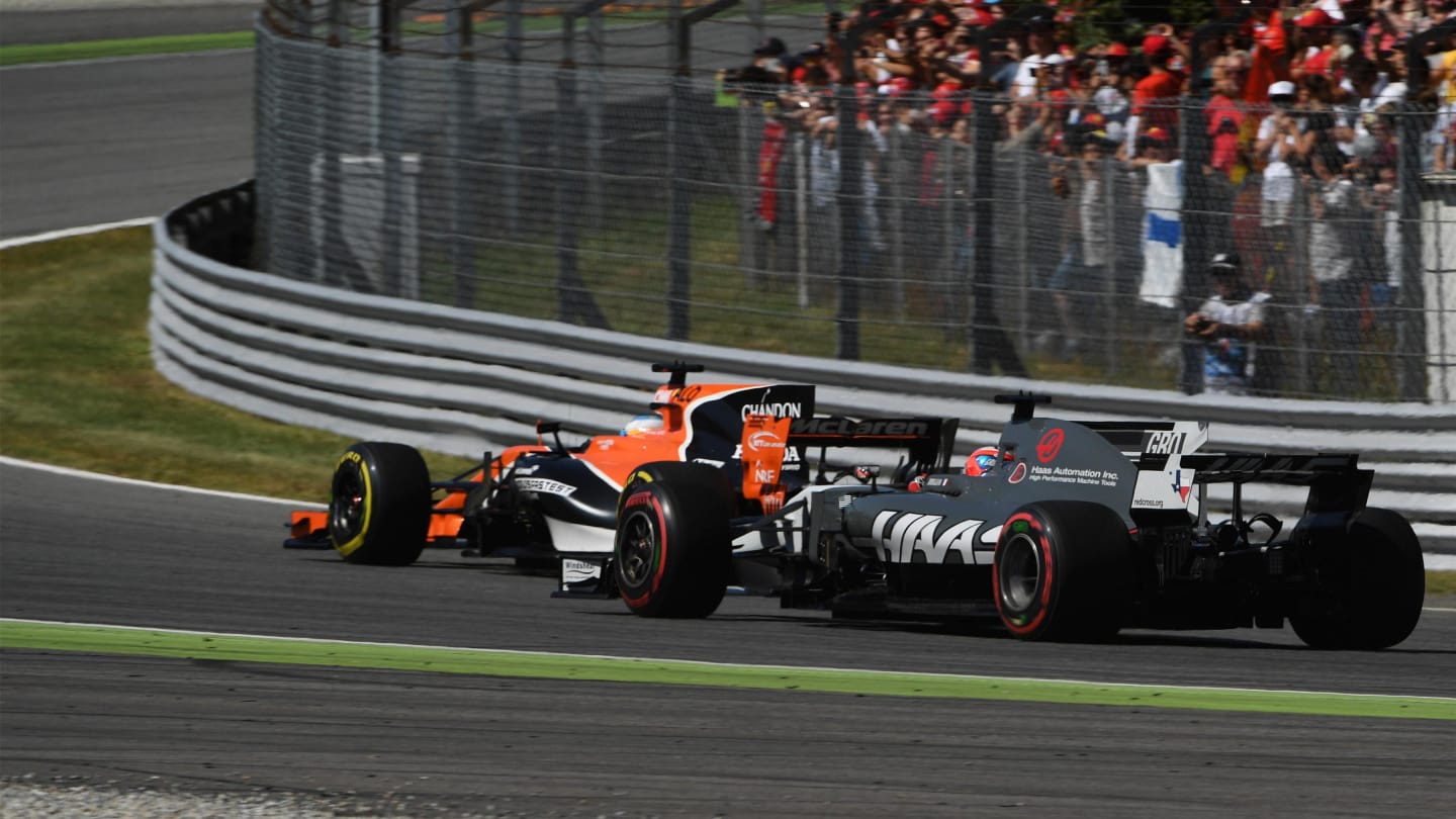 Fernando Alonso (ESP) McLaren MCL32 and Romain Grosjean (FRA) Haas VF-17 at Formula One World Championship, Rd13, Italian Grand Prix, Race, Monza, Italy, Sunday 3 September 2017. © Sutton Images