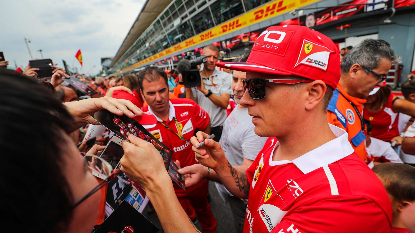 Kimi Raikkonen (FIN) Ferrari signs autographs for the fans at Formula One World Championship, Rd13, Italian Grand Prix, Preparations, Monza, Italy, Thursday 31 August 2017. © Sutton Images