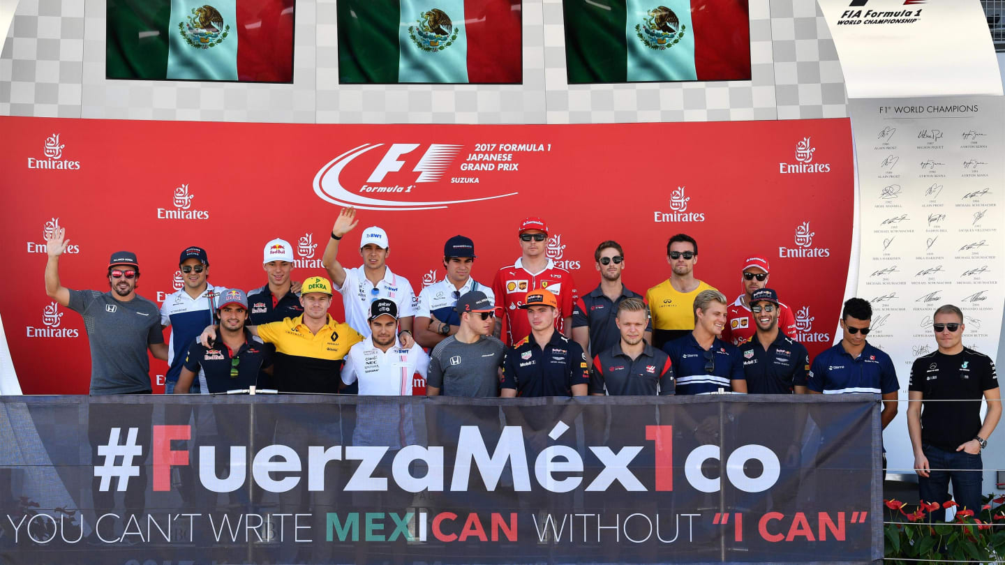 Drivers on the podium with #FuerzaMex1co sign at Formula One World Championship, Rd16, Japanese Grand Prix, Race, Suzuka, Japan, Sunday 8 October 2017. © Mark Sutton/Sutton Images