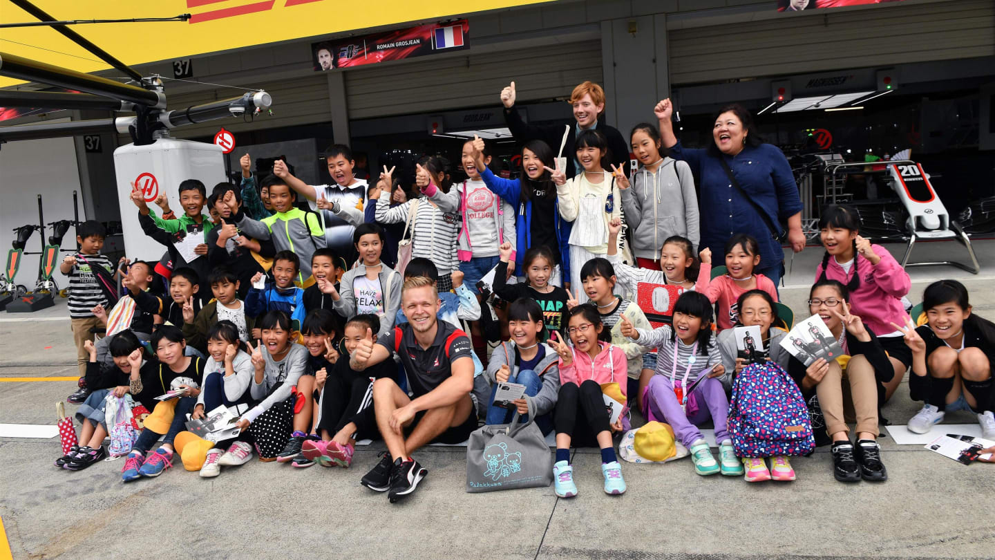 Kevin Magnussen (DEN) Haas F1 and young fans at Formula One World Championship, Rd16, Japanese Grand Prix, Preparations, Suzuka, Japan, Thursday 5 October 2017. © Mark Sutton/Sutton Images