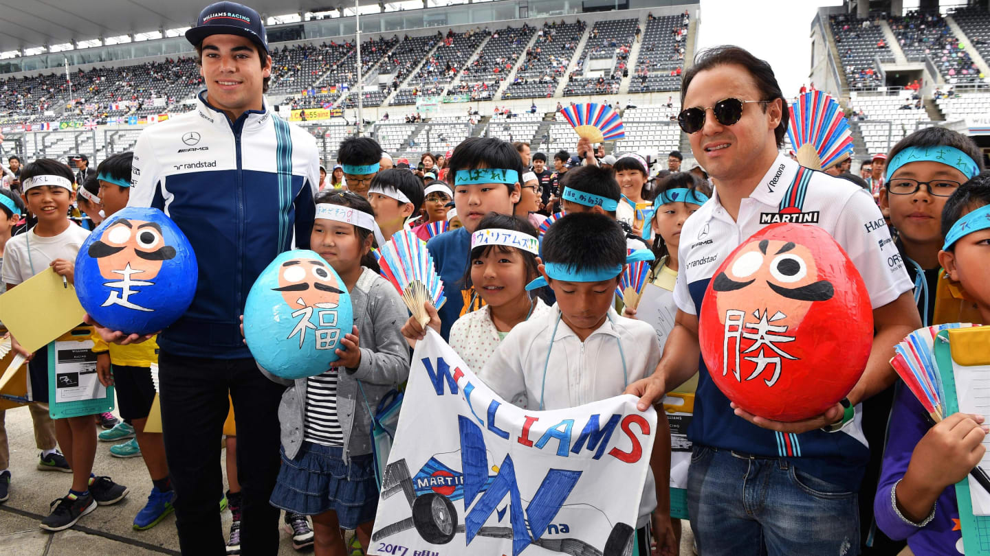 Lance Stroll (CDN) Williams and Felipe Massa (BRA) Williams with young Williams fans at Formula One World Championship, Rd16, Japanese Grand Prix, Preparations, Suzuka, Japan, Thursday 5 October 2017. © Mark Sutton/Sutton Images