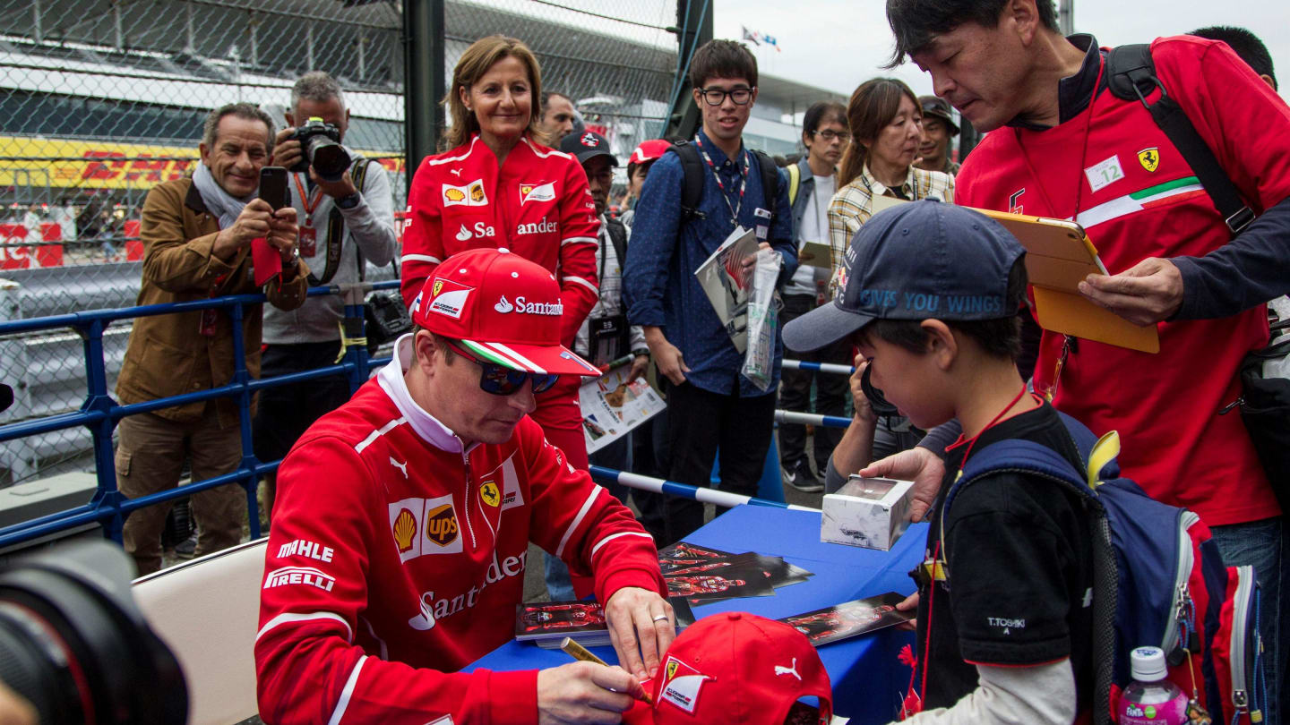Kimi Raikkonen (FIN) Ferrari signs autographs for the fans at Formula One World Championship, Rd16, Japanese Grand Prix, Preparations, Suzuka, Japan, Thursday 5 October 2017. © Manuel Goria/Sutton Images