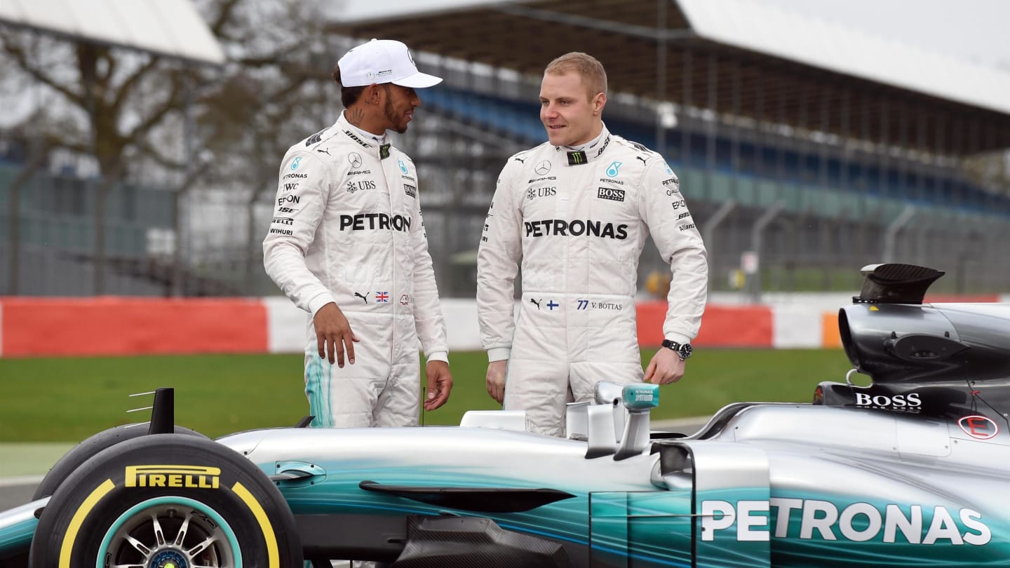 Lewis Hamilton (GBR) Mercedes AMG F1 and Valtteri Bottas (FIN) Mercedes AMG F1 with the new Mercedes-Benz F1 W08 Hybrid at Mercedes-Benz F1 W08 Hybrid Launch, Silverstone, England, 23 February 2017. © Sutton Images