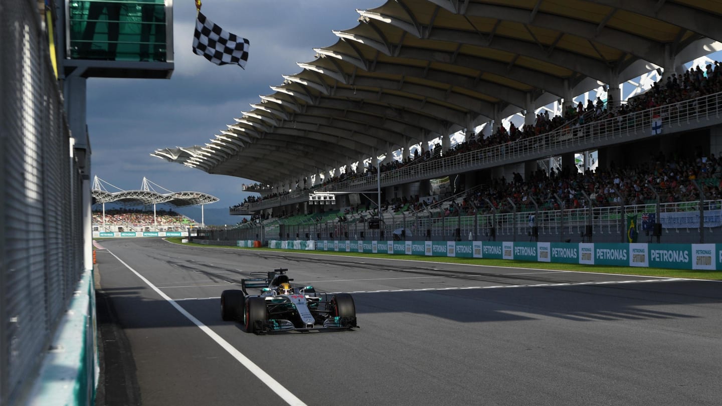 Pole sitter Hamilton (GBR) Mercedes-Benz F1 W08 Hybrid takes the chequered flag at the end of Qualifying at Formula One World Championship, Rd15, Malaysian Grand Prix, Qualifying, Sepang, Malaysia, Saturday 30 September 2017. © Manuel Goria/Sutton Images