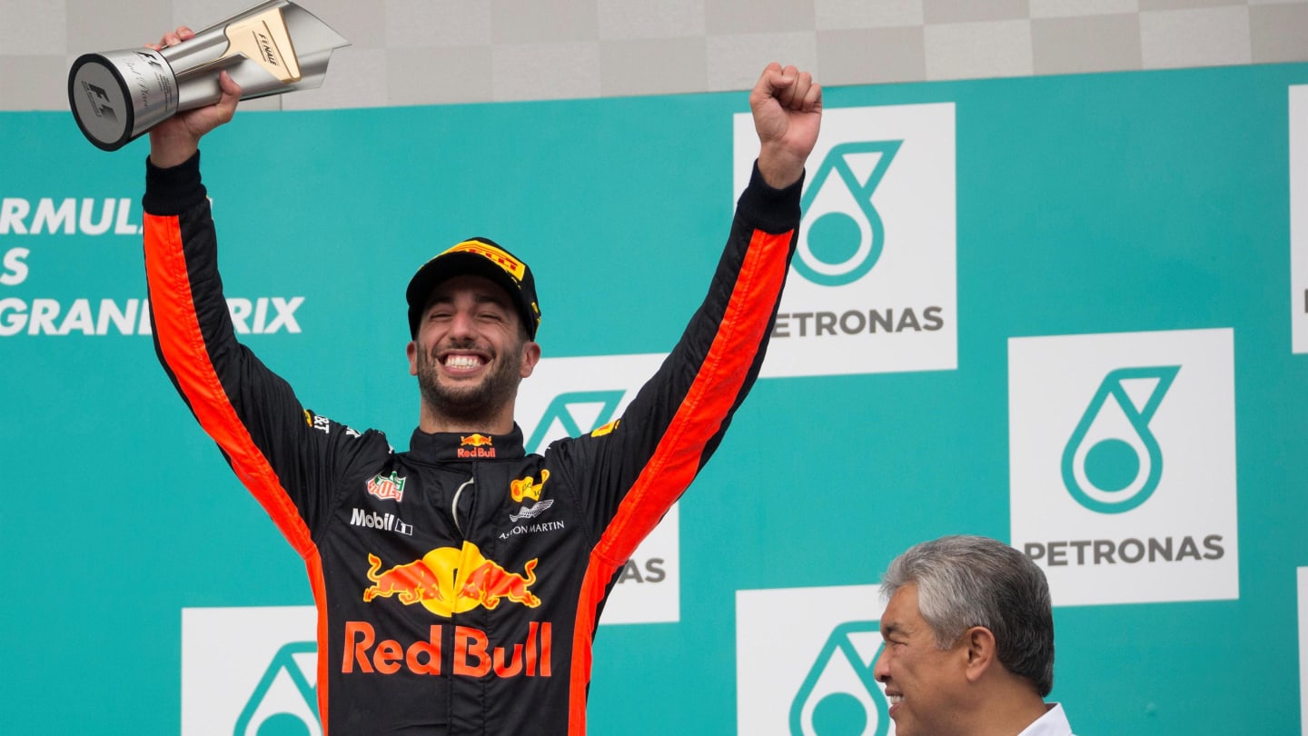Daniel Ricciardo (AUS) Red Bull Racing celebrates on the podium with the trophy at Formula One World Championship, Rd15, Malaysian Grand Prix, Race, Sepang, Malaysia, Sunday 1 October 2017. © Manuel Goria/Sutton Images