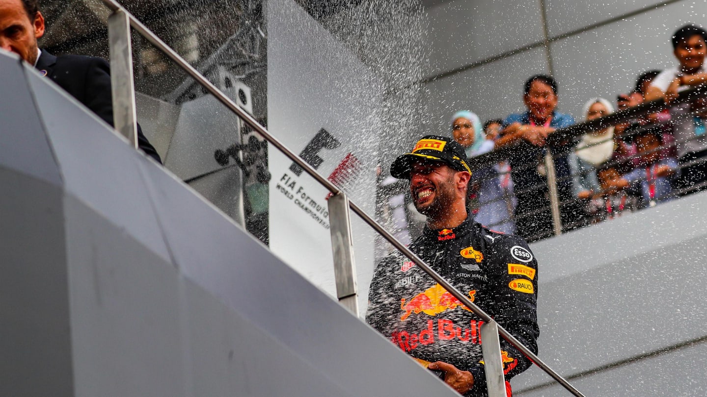Daniel Ricciardo (AUS) Red Bull Racing celebrates on the podium with the champagne at Formula One World Championship, Rd15, Malaysian Grand Prix, Race, Sepang, Malaysia, Sunday 1 October 2017. © Kym Illman/Sutton Images