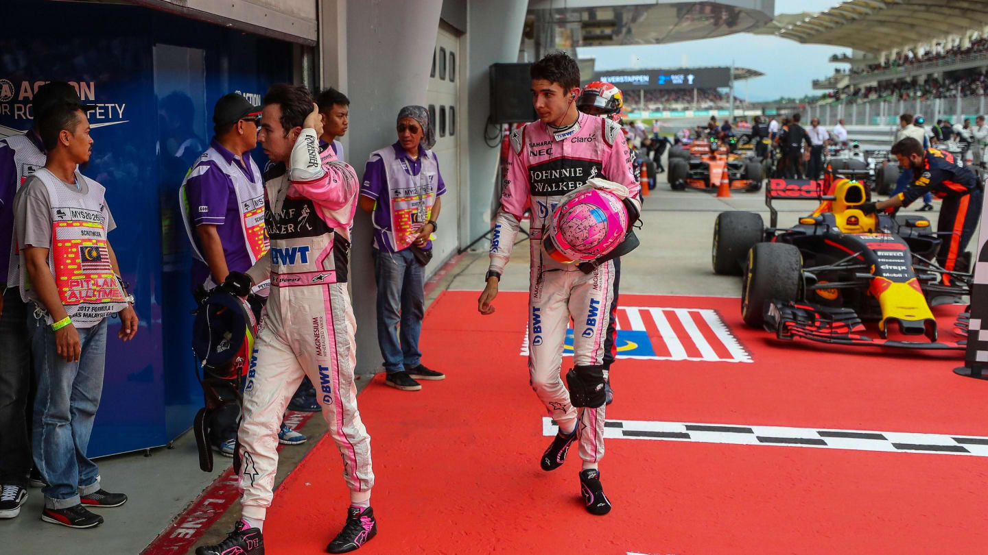 Esteban Ocon (FRA) Force India and Sergio Perez (MEX) Force India in parc ferme at Formula One World Championship, Rd15, Malaysian Grand Prix, Race, Sepang, Malaysia, Sunday 1 October 2017. © Kym Illman/Sutton Images