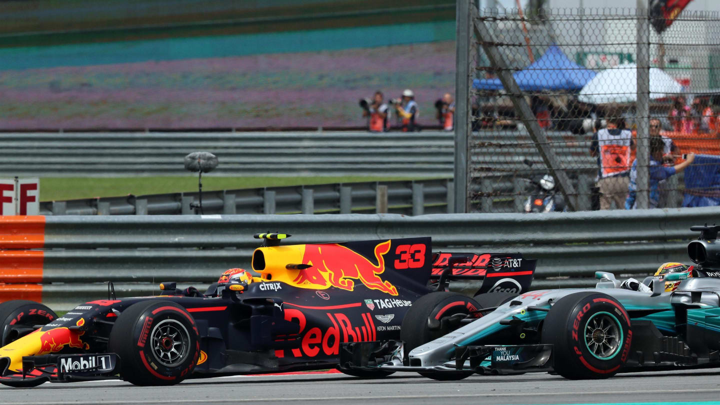 Max Verstappen (NED) Red Bull Racing RB13 and Lewis Hamilton (GBR) Mercedes-Benz F1 W08 Hybrid battle at Formula One World Championship, Rd15, Malaysian Grand Prix, Race, Sepang, Malaysia, Sunday 1 Octoberr 2017. © Kym Illman/Sutton Images